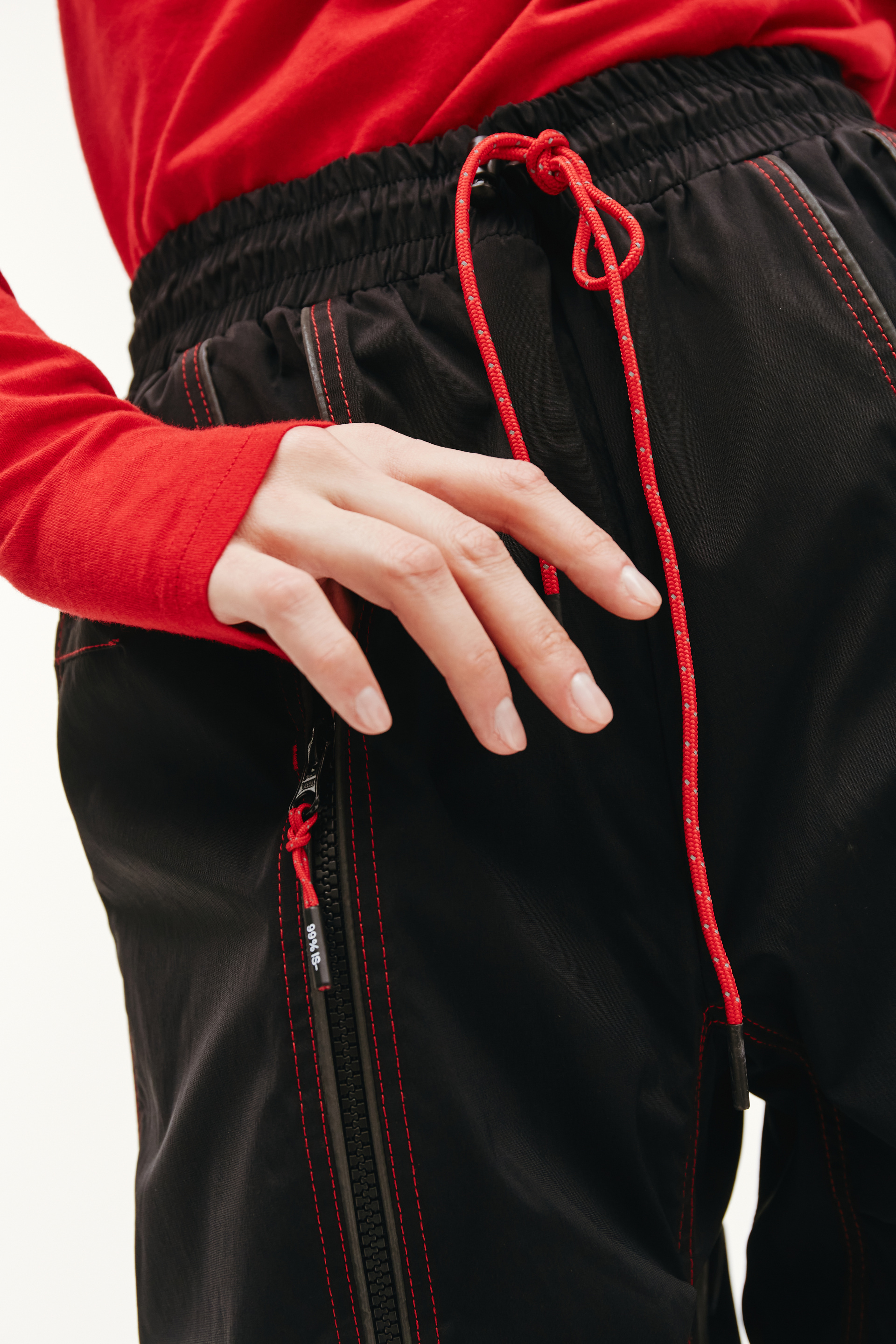 99% IS Black Trousers With Red Seams