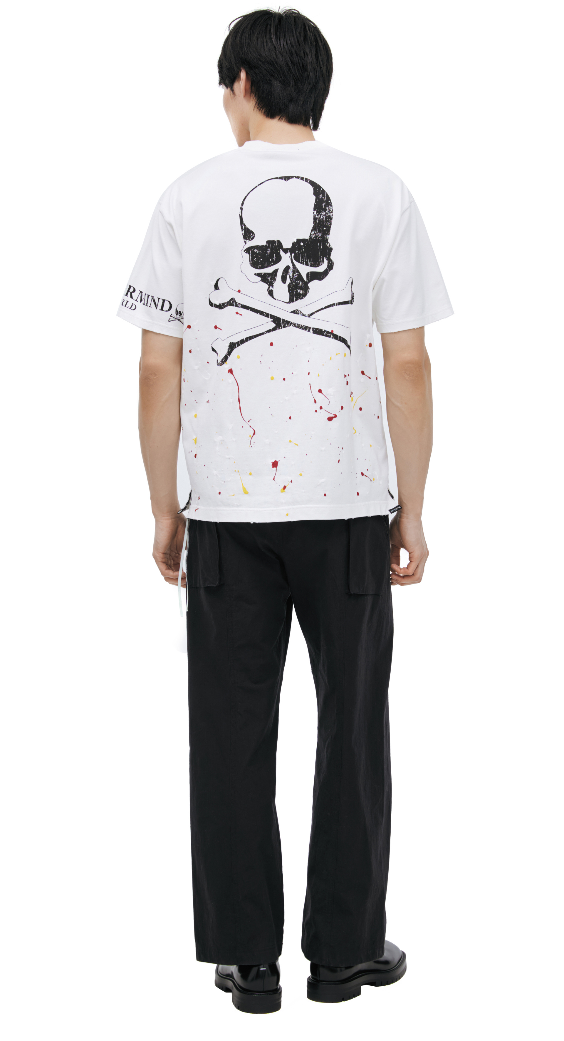 Mastermind WORLD T-shirt with a paint splatter effect